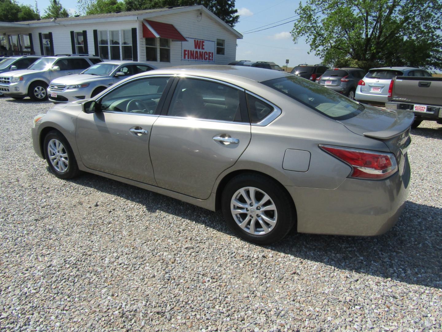 2014 Gold /Tan Nissan Altima (1N4AL3AP0EC) with an 4 CYL engine, Automatic transmission, located at 15016 S Hwy 231, Midland City, AL, 36350, (334) 983-3001, 31.306210, -85.495277 - Photo#5
